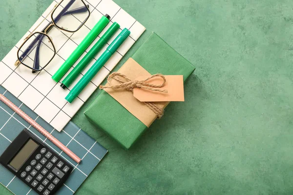 Gift Box Calculator Eyeglasses Different Stationery Grunge Green Background — Stock Photo, Image