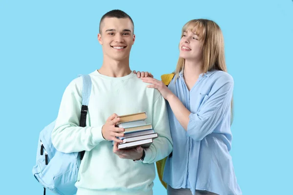 Couple Teenage Students Blue Background — Stock Photo, Image