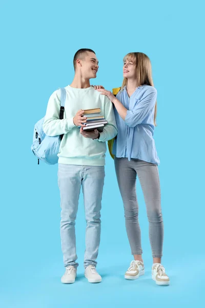 Couple Teenage Students Blue Background — Stock Photo, Image