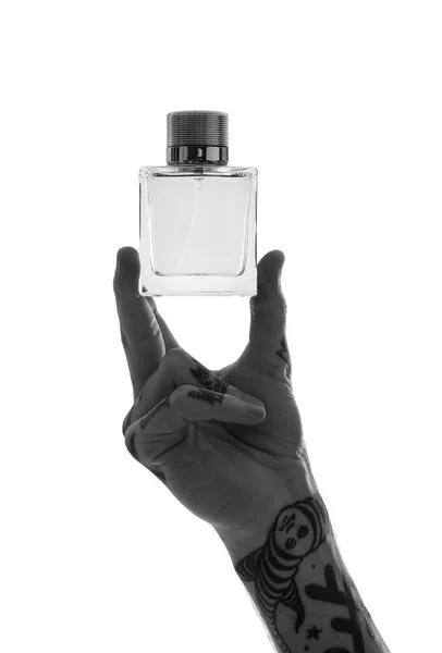 Getatoeëerde Jongeman Met Parfum Witte Achtergrond Close — Stockfoto