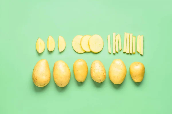 Whole Cut Potatoes Green Background — Stock Photo, Image