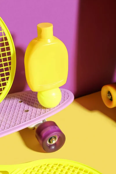 Composition Bottle Sunscreen Cream Skateboard Tennis Rackets Ball Color Background — Stock Photo, Image