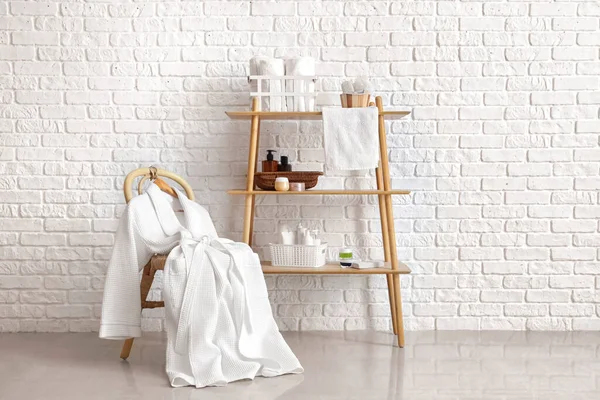 Shelving Unit Bath Accessories Bathrobe Chair White Brick Wall — Stock Photo, Image