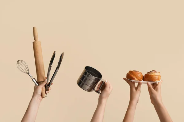 Female Hands Baking Utensils Beige Background Stock Photo by ©serezniy  666066564