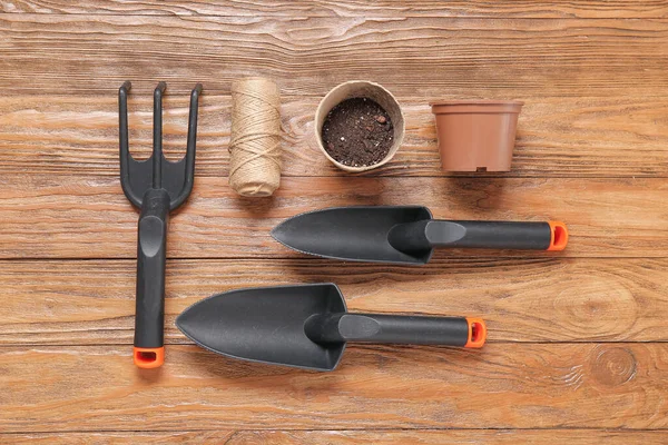 Different Gardening Tools Wooden Background — Stock Photo, Image