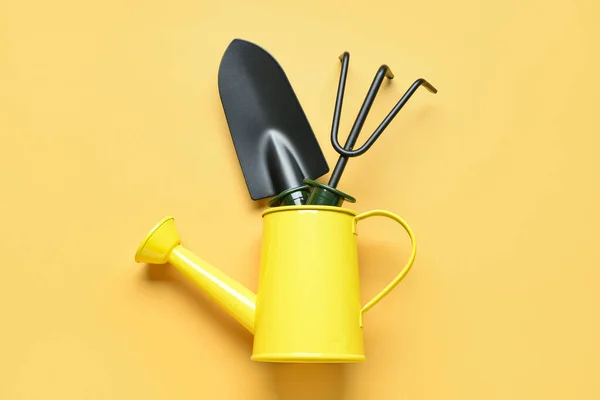 Watering Can Gardening Rake Shovel Yellow Background — Stock Photo, Image