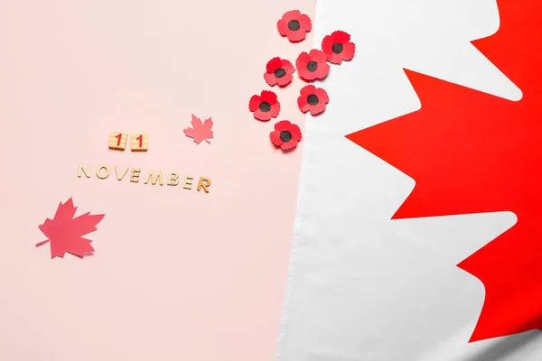 Flores Amapola Con Bandera Canadá Texto Noviembre Sobre Fondo Rosa —  Fotos de Stock