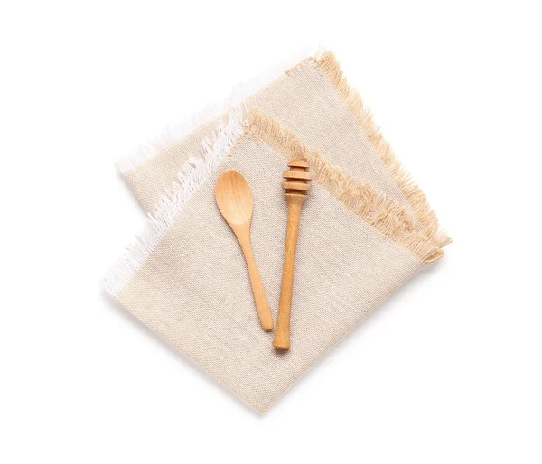 白い背景にきれいなナプキン 木製のスプーンと蜂蜜のディップ — ストック写真