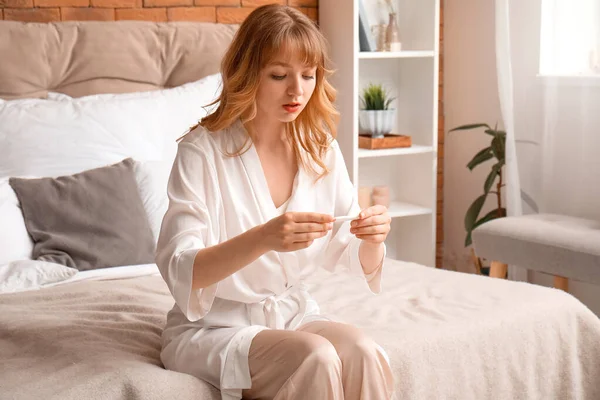 Sad Young Woman Pregnancy Test Bedroom — Stock Photo, Image