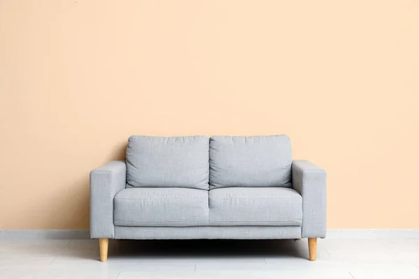 Cozy Grey Sofa Beige Wall — Stock Photo, Image