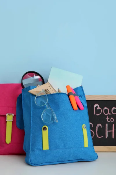 Colorful School Backpacks Stationery Blackboard Text Back School White Table — Stock Photo, Image