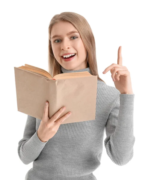 Mujer Joven Con Libro Abierto Apuntando Algo Sobre Fondo Blanco — Foto de Stock