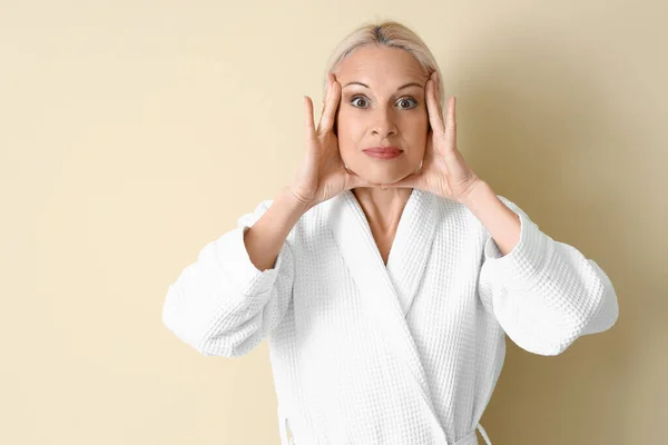 Mature Woman Doing Face Building Exercise Beige Background — Stock Photo, Image