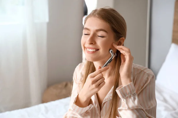Young Woman Facial Massage Tool Bedroom Closeup — Stock Photo, Image