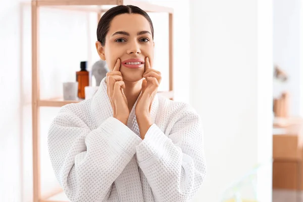 Young Woman Doing Face Building Exercise Bathroom — Stock Photo, Image