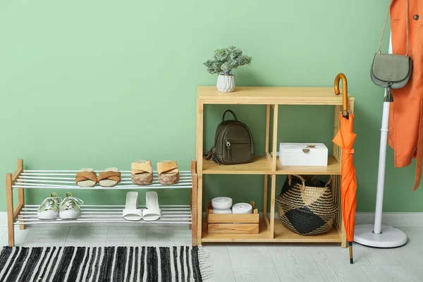 Shelving Unit Stand Shoes Green Wall Hall — Stock Photo, Image