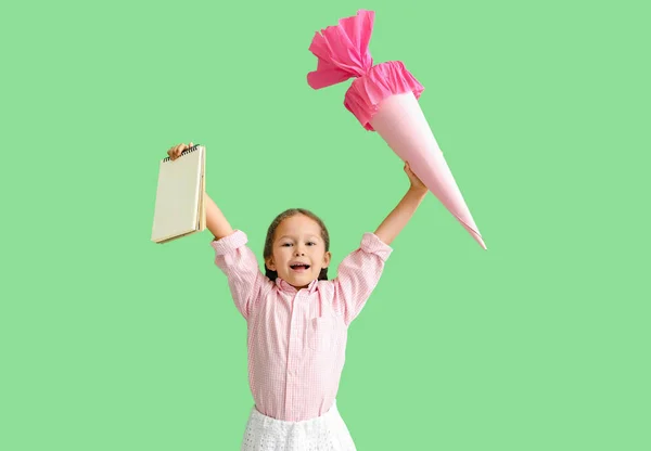 Little Girl Pink School Cone Blank Notebook Green Background — Stock Photo, Image