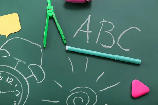 Different Stationery Drawings Green Chalkboard — Stock Photo, Image