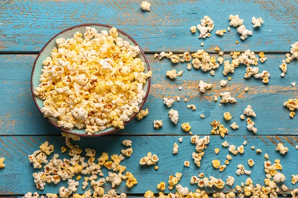 Bowl Tasty Popcorn Blue Wooden Background — Stock Photo, Image