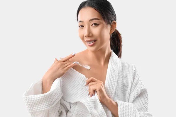 Beautiful Asian Woman Applying Body Cream White Background — Stock Photo, Image