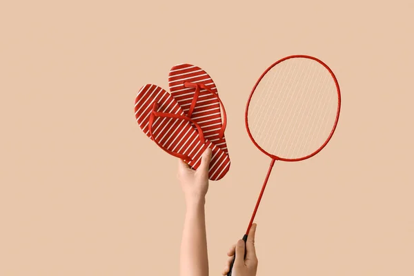 Female Hands Flip Flops Badminton Racket Beige Background — Stock Photo, Image