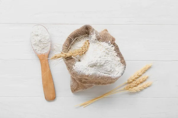 Bag Wheat Flour Spikelets Spoon White Wooden Table — Stock Photo, Image