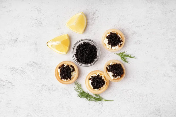 Tasty Tartlets Black Caviar Light Background — Stock Photo, Image