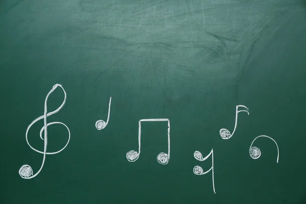 Diferentes Notas Musicales Sobre Fondo Verde — Foto de Stock