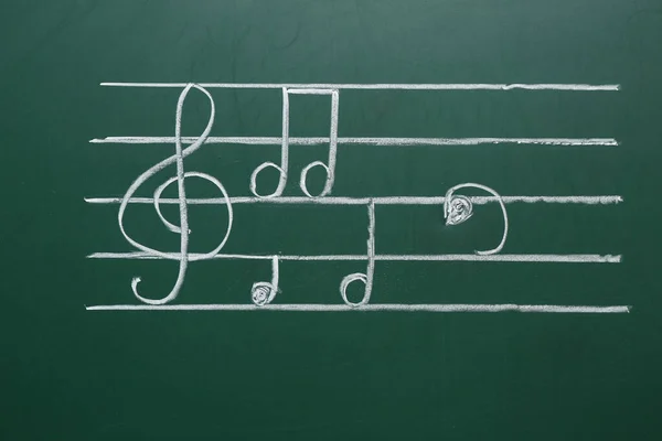 Diferentes Notas Musicales Sobre Fondo Verde — Foto de Stock