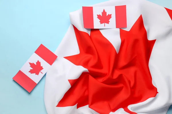 蓝色背景的加拿大国旗 — 图库照片