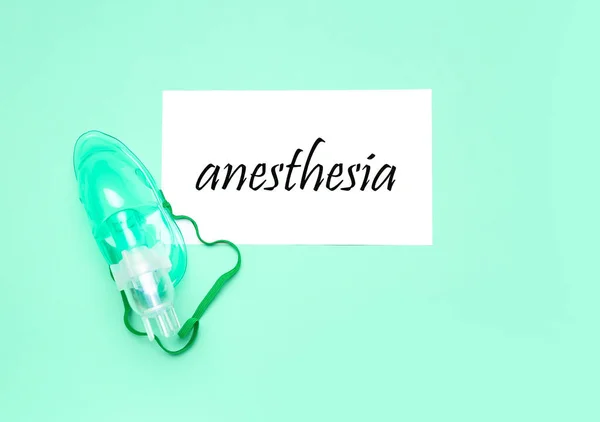 Paper Word Anesthesia Oxygen Mask Green Background — Stock Photo, Image