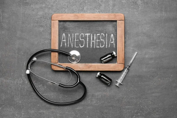 Chalkboard Word Anesthesia Stethoscope Ampules Syringe Dark Background — Stock Photo, Image