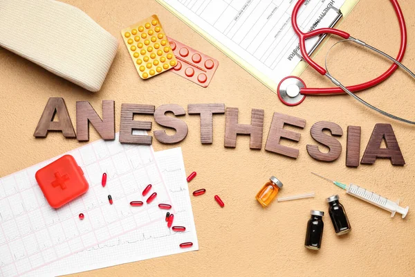 Word Anesthesia Medical Supplies Beige Background — Stock Photo, Image