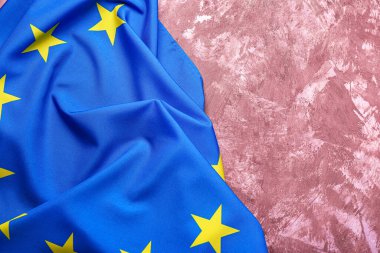 Flag of European Union on grunge pink background