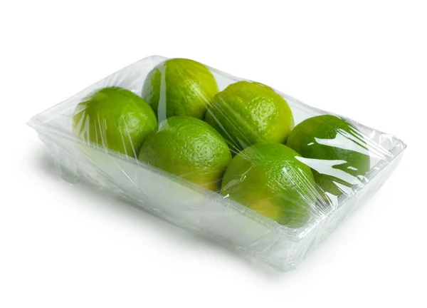Limes Fresco Involucro Plastica Alimentare Sfondo Bianco — Foto Stock