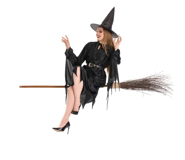 Красивая Молодая Ведьма Сидит Метле Белом Фоне — стоковое фото