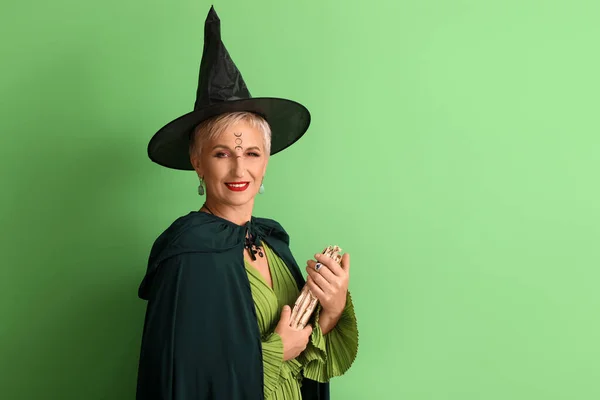 Mature Witch Spell Book Green Background — Stok fotoğraf