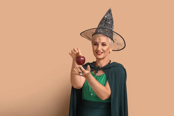 Mature Witch Apple Beige Background — Stok fotoğraf