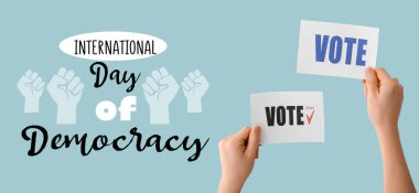 Uluslararası Demokrasi Günü için bayanların oy pusulalarıyla bayrak