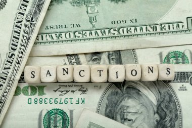 Kelime SANCTIONS dolar banknotları, yakın çekim