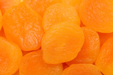 Texture of tasty dried apricots as background