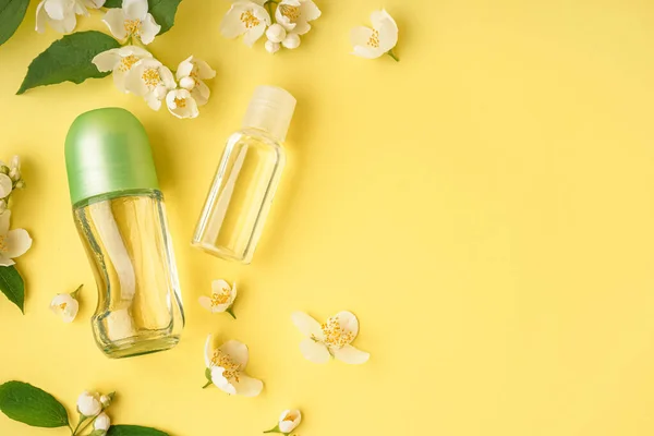 Composition Cosmetic Products Beautiful Jasmine Flowers Yellow Background — Stock Photo, Image
