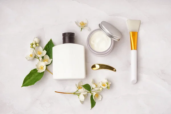 Composition Cosmetic Products Spatulas Beautiful Jasmine Flowers Light Background — Stock Photo, Image