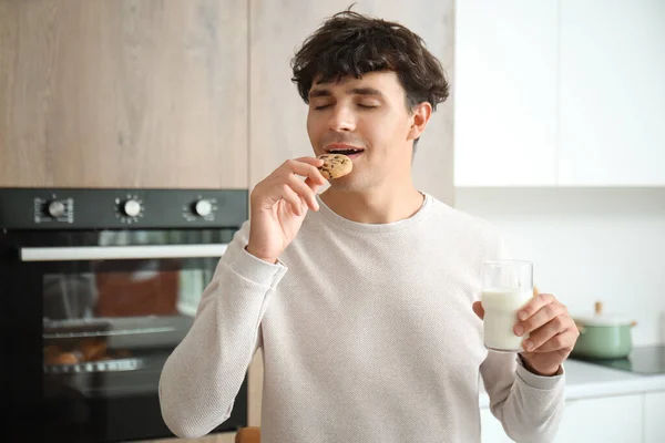 Young Man Drinking Fresh Milk Eating Cookie Kitchen — Stock Photo, Image
