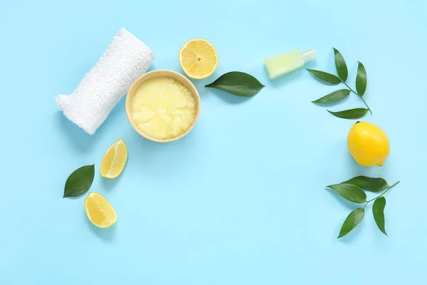 Bowl Lemon Body Scrub Cosmetic Bottle Towel Blue Background — Stock Photo, Image