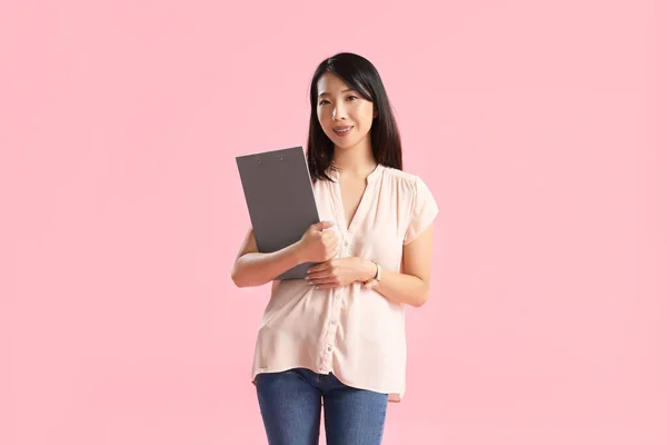 Female Asian Teacher Clipboard Pink Background — Stock Photo, Image