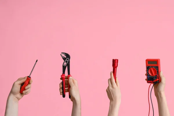 Electrician Hands Tools Pink Background — 스톡 사진