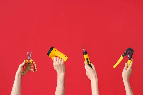 Electrician Hands Tools Red Background — Stock Photo, Image