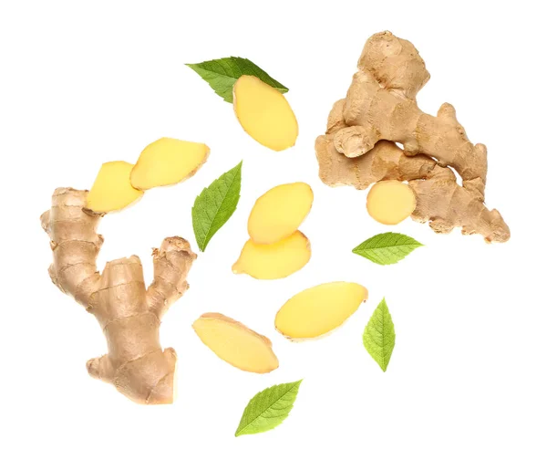 Flying Slices Fresh Ginger Roots Leaves White Background — Stock Photo, Image