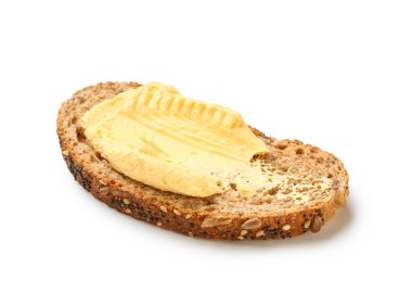 Tasty toast with butter on white background
